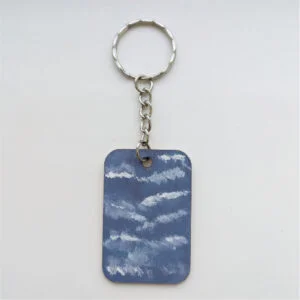 wood keychain with blue sky design