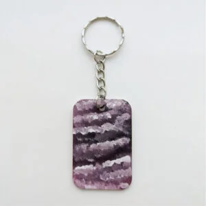 wood keychain with red abstract design