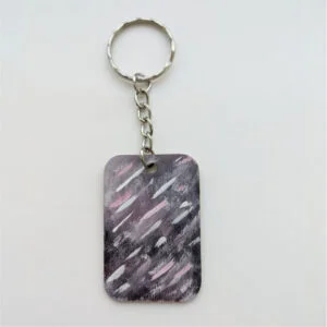 wood keychain with purple abstract design