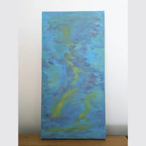table with large canvas with abstract painting containing blue, purple and green colours