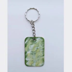 wood keychain with green abstract design