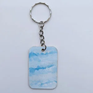 wood keychain with blue abstract design