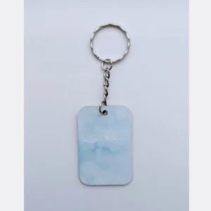 wood keychain with blue abstract design