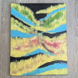 abstract painting against wood background